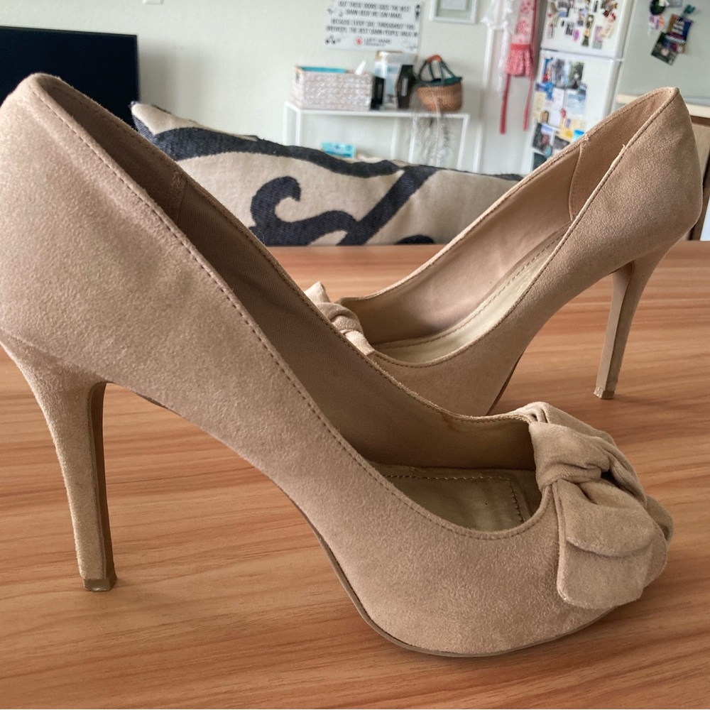 Nude approx. 4 1/2 inch peekaboo heel, size 12